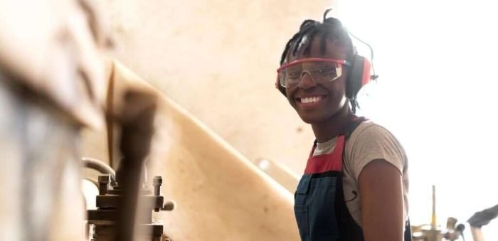 carpenter-cutting-mdf-board-inside-workshop