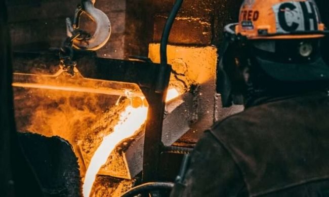 vertical-shot-adult-industrial-worker-uniforms-melting-metal-factory vertical-shot-adult-industrial-worker-uniforms-melting-metal-factory